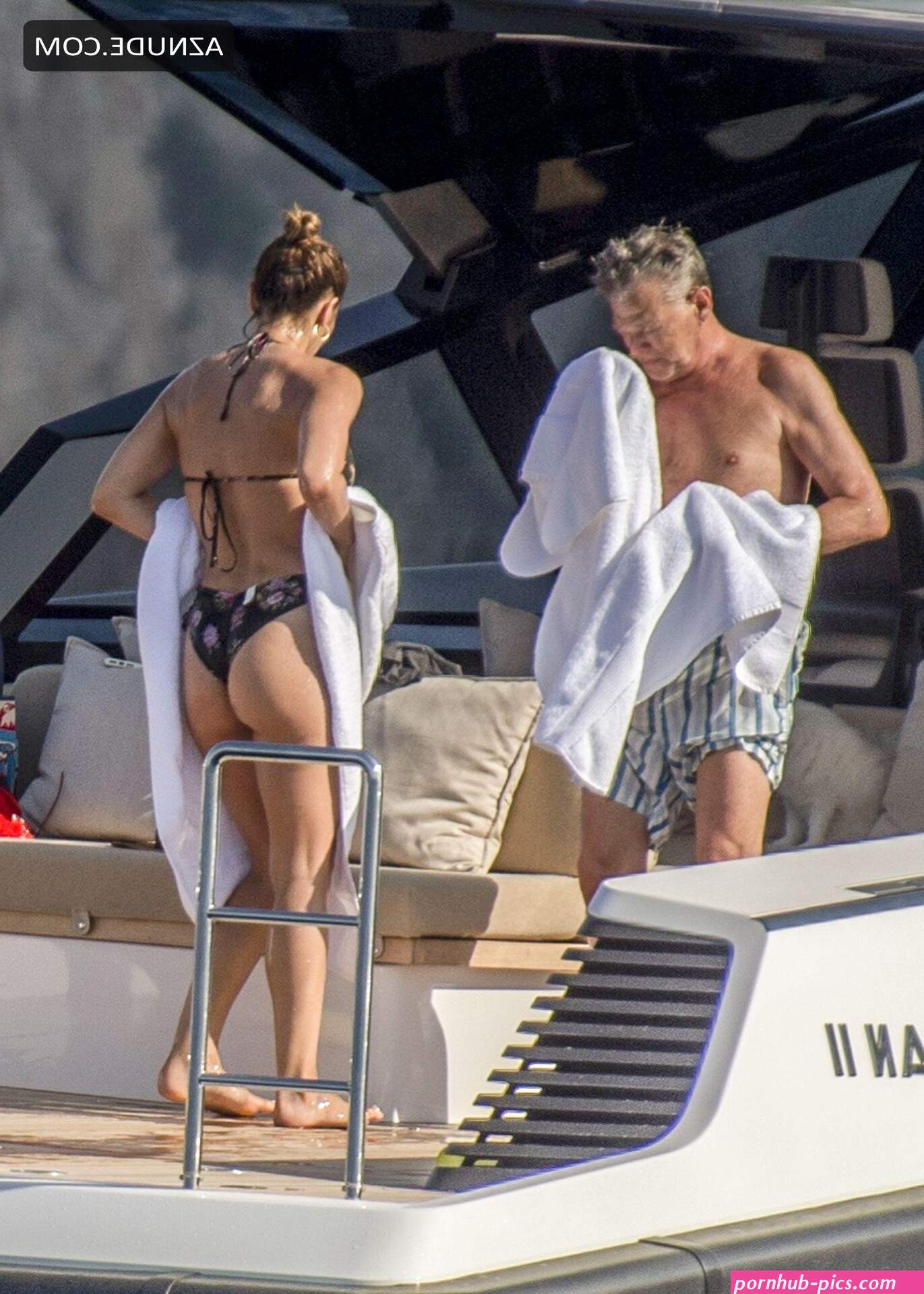 Katharine McPhee and David Foster take a dip in the ocean while relaxing on their yacht during their honeymoon in Capri