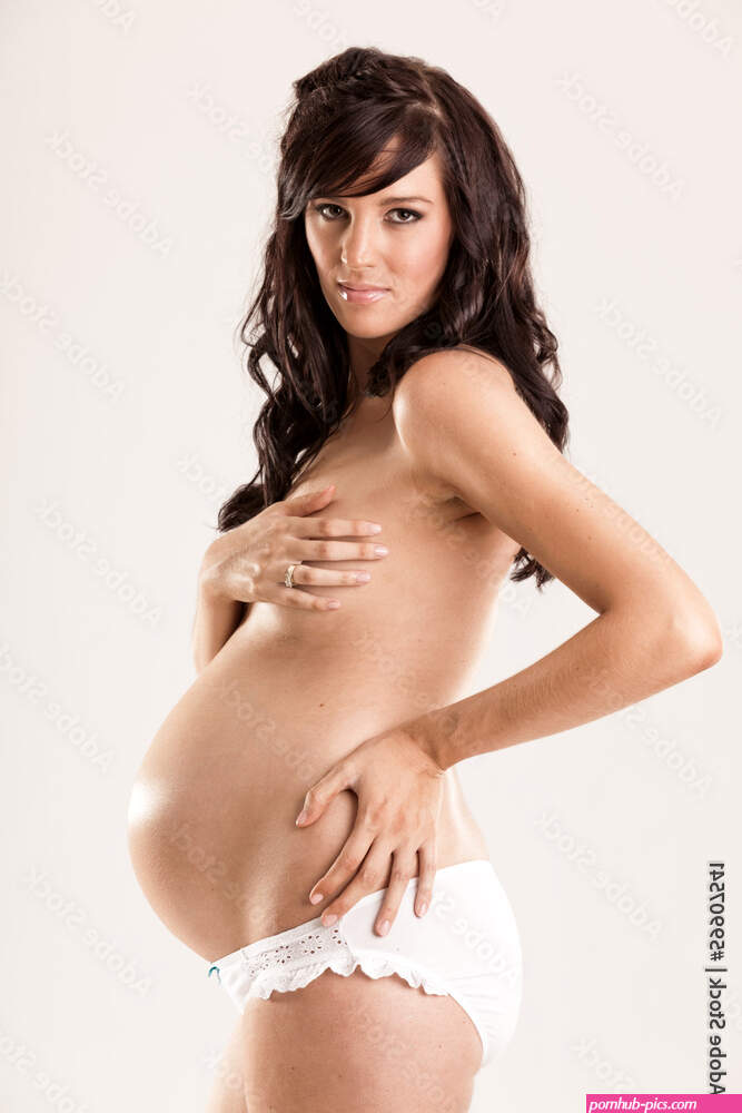 Young nude pregnant woman in white undies Stock Photo | Adobe Stock