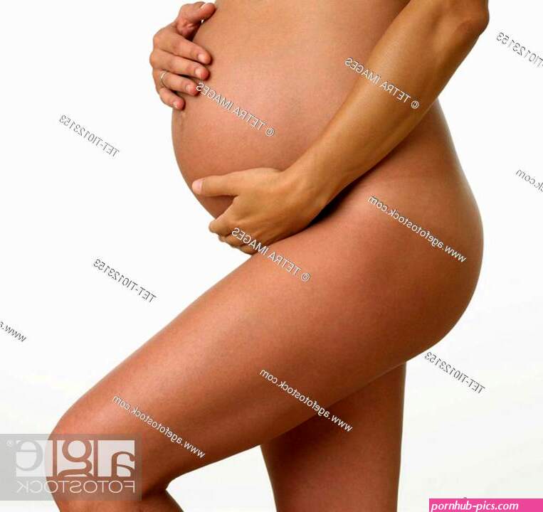 Studio shot of nude pregnant woman holding stomach, Stock Photo, Picture And Royalty Free Image. Pic. TET-TI0123153 | agefotostock