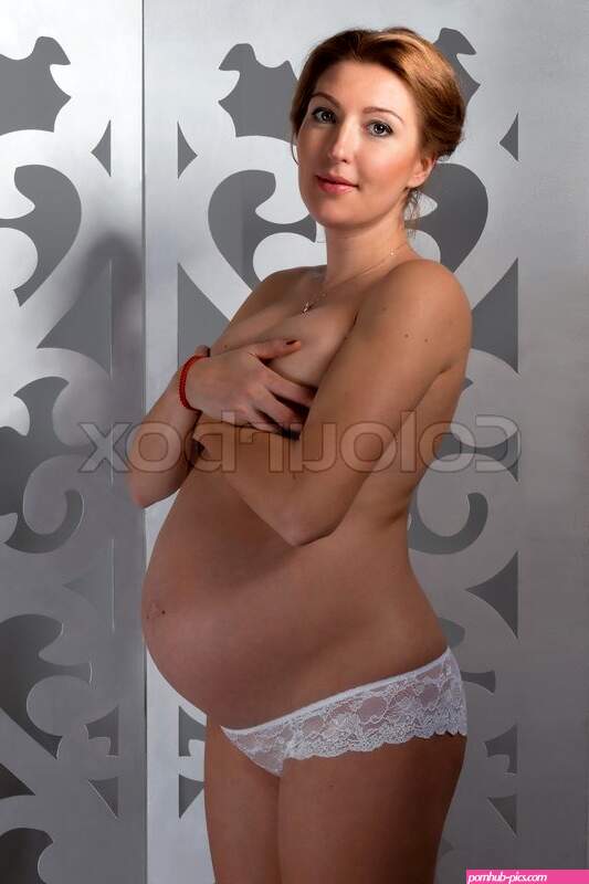 Young beautiful nude pregnant woman on a white background. | Stock image | Colourbox