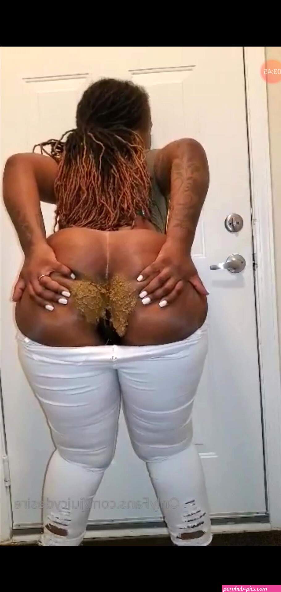 Ebony Shits with White Pants