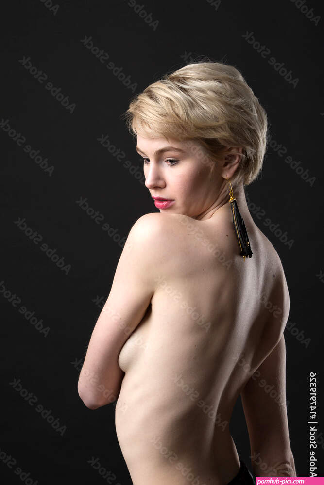 Portrait of beautiful nude short hair woman with jewelry accessories. Naked sexy blonde girl with brush earring. Isolated black background. Stock Photo | Adobe Stock