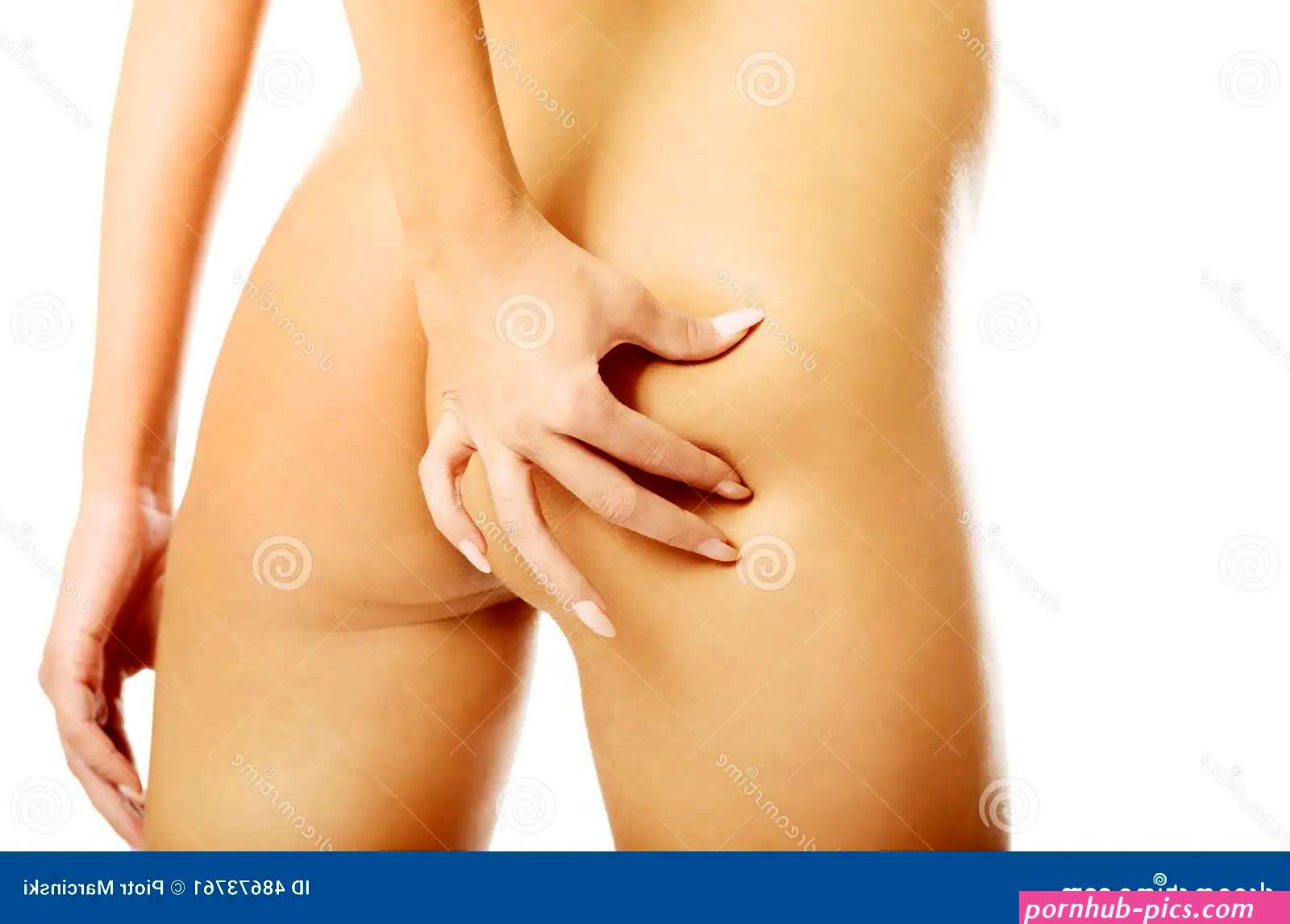 Back View of a Nude Woman Checking Fat on Stock Image