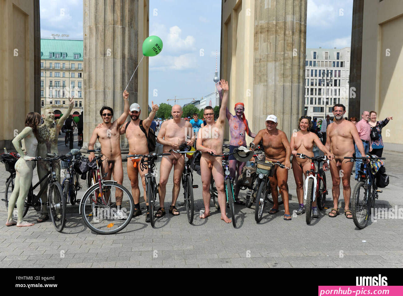 Nude cyclists at the Brandenburg Gate Berlin Germany Deutschland Europe Stock Photo