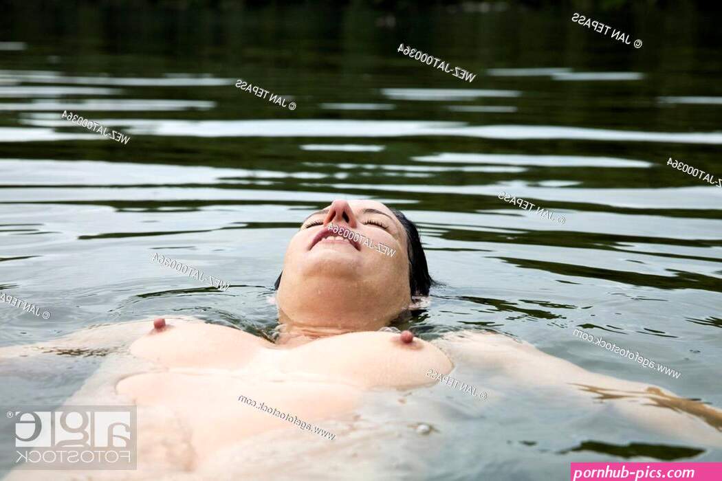 Germany, North Rhine-Westphalia, Cologne, Nude woman in a lake, Stock Photo, Picture And Rights Managed Image. Pic. WEZ-JAT000364 | agefotostock