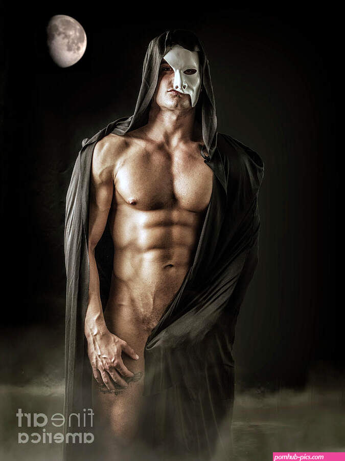 Muscular nude man in mask and gown Photograph by Stefano C