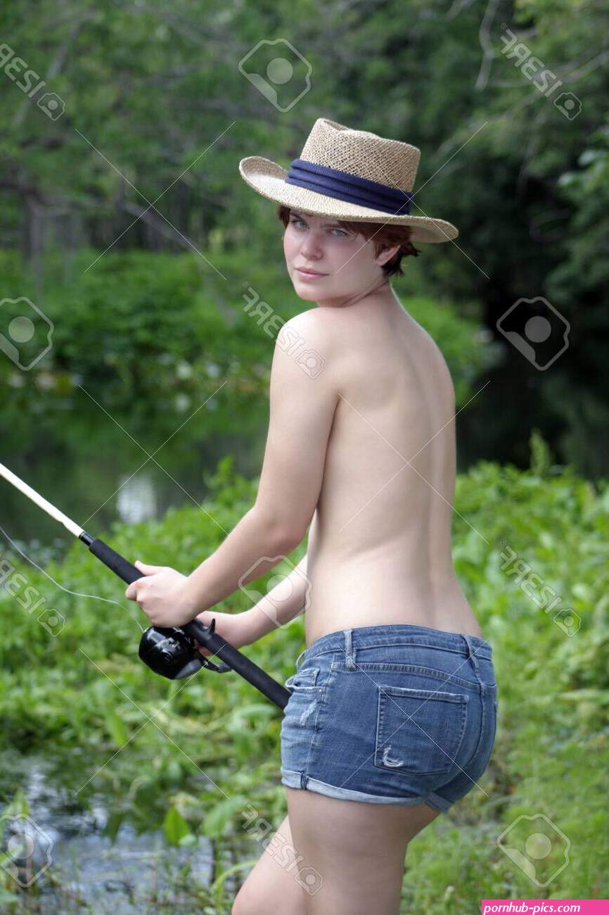 A Lovely, Sexy, Young Topless Girl With A Fishing Rod Stands On A Creekbank In A Lush, Tropical Forest Stock Photo, Picture And Royalty Free Image. Image 27753201.