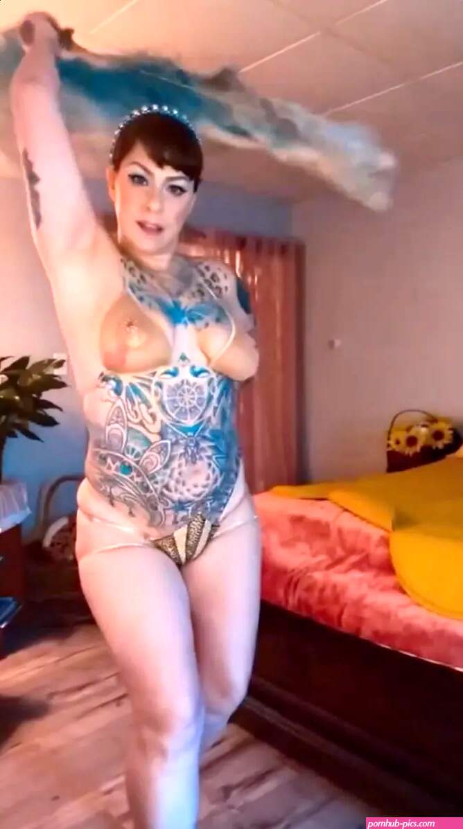 American Pickers' Danielle Colby shows off her bare boobs and butt in sheer thong bikini as she dances in NSFW new video