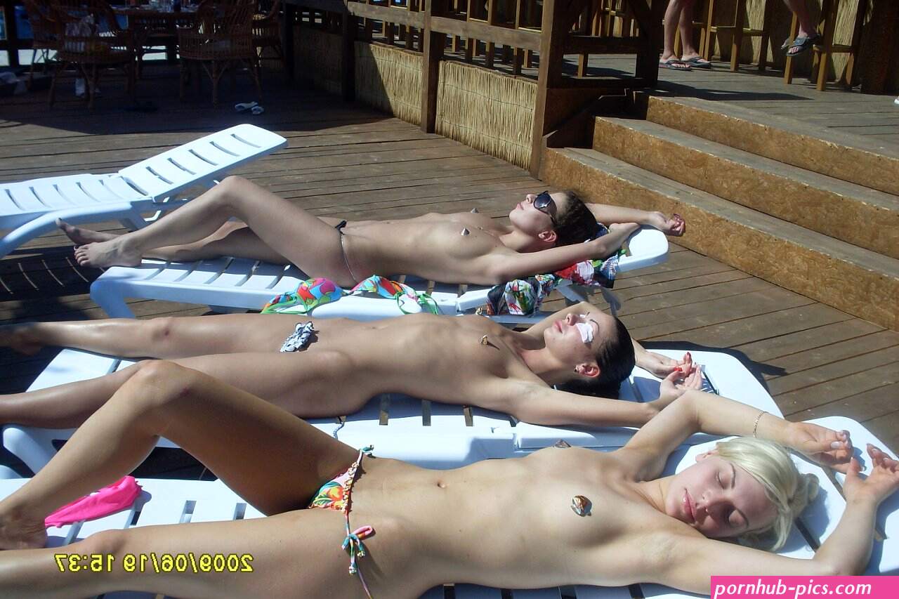 summer girls topless sunbathing