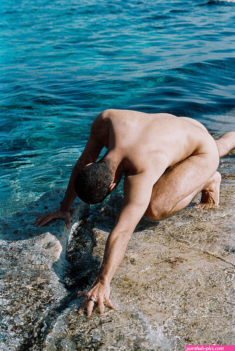 Sunbathing Nude Man by Stocksy Contributor Lucas Ottone