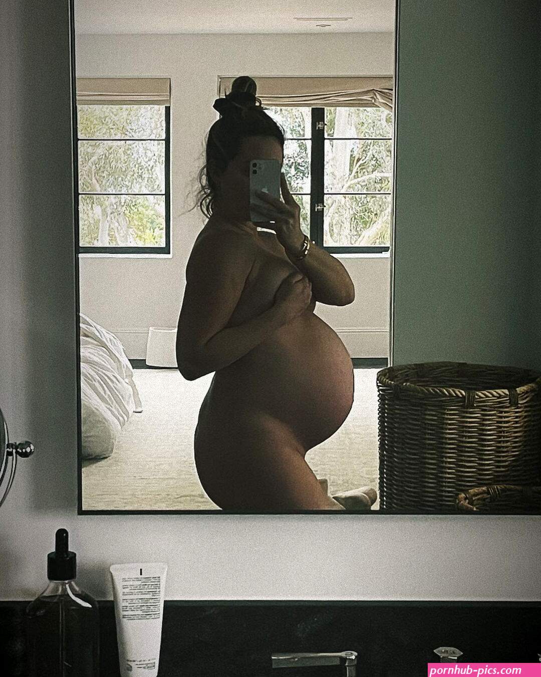 Pregnant Ashley Tisdale shows off baby bump as she poses completely nude in new selfie and tells fans thank your body