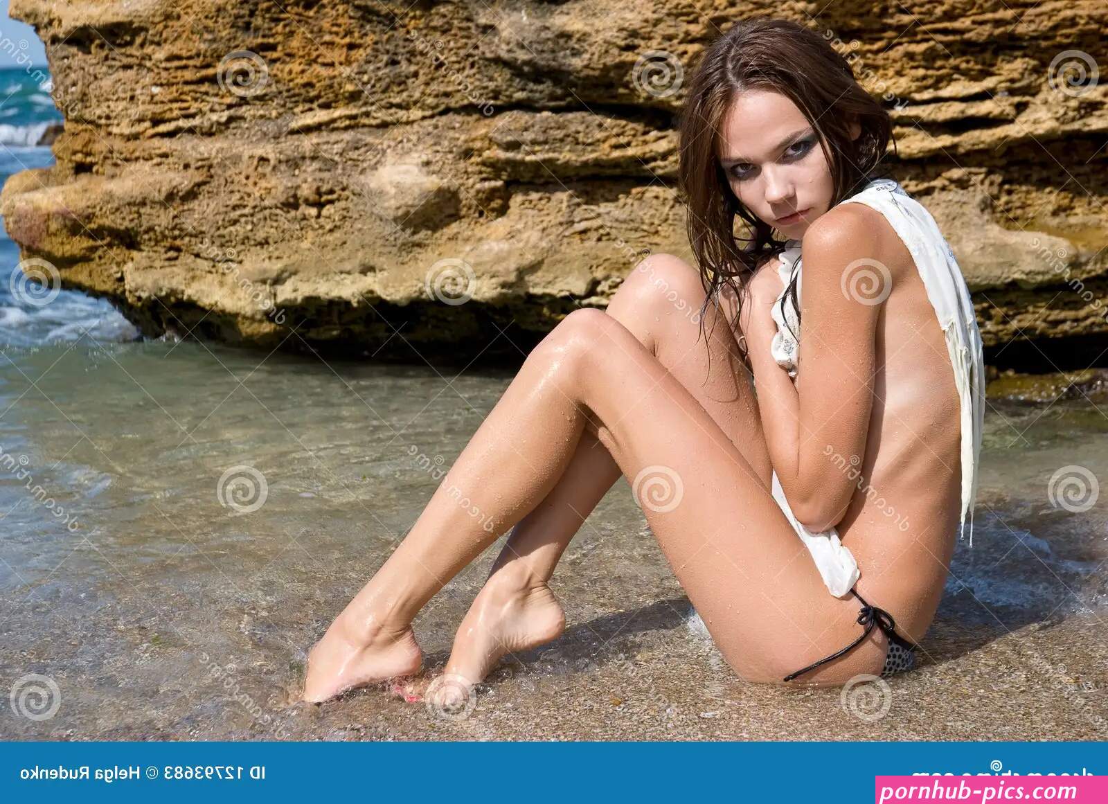 Nude Young Girl in the Beach Stock Image