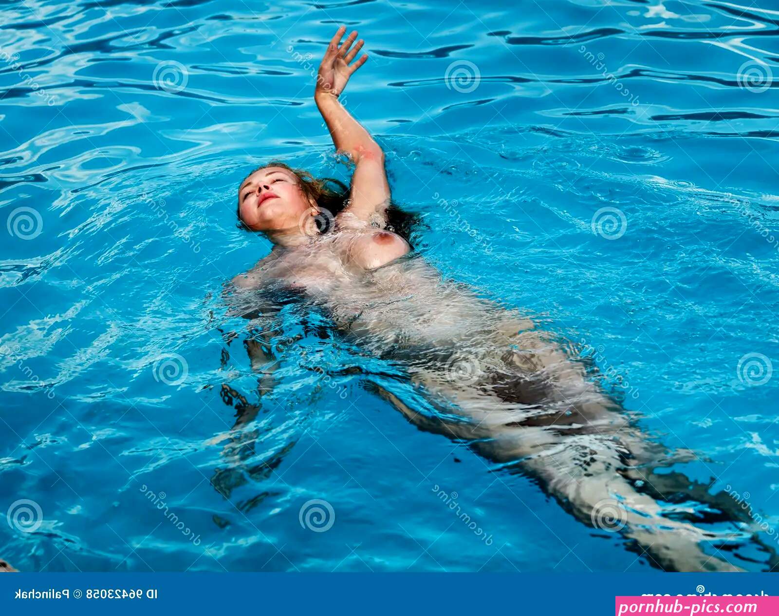 Naked Woman in Swimming Pool Stock Photo