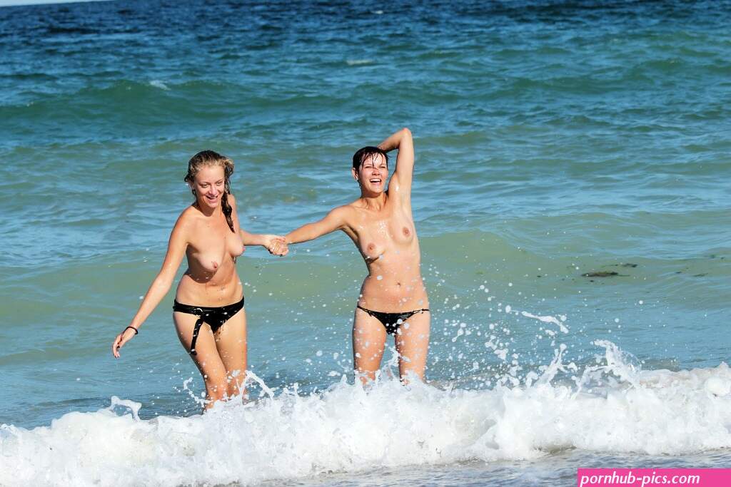 File:Topless women at the shore.jpg