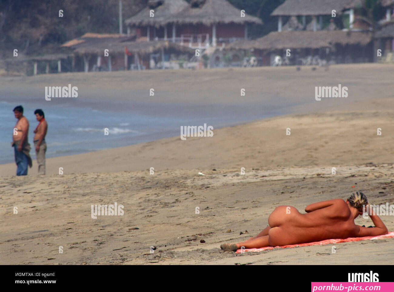 Naked woman sunbathing at beach Playa Zipolite Puerto Angel Oaxaca Mexico Stock Photo