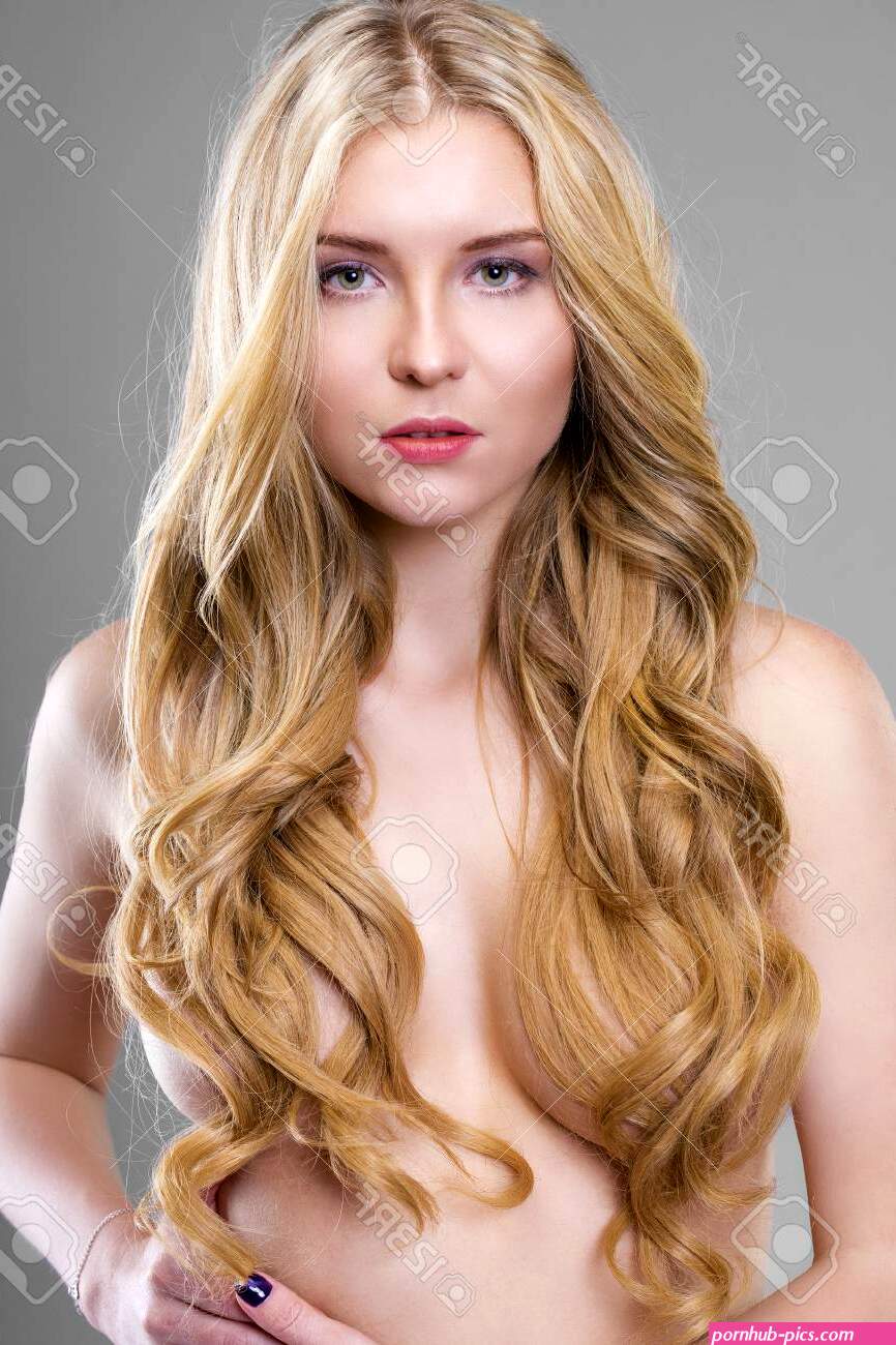 Nude Beautiful Young Woman. Sexy Blonde Girl With Curly Hair. Closes The Chest Stock Photo Picture and Royalty Free Image. Image 68982513.
