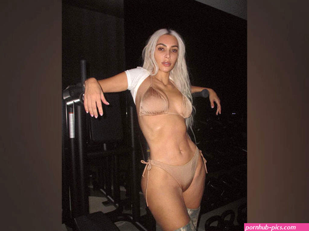 Kim Kardashian hits the gym in nude bikini