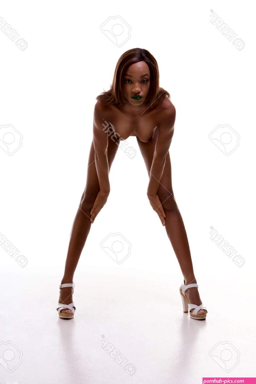 Nude Ethnic Topless Young African-American Female Model With Green Lips Wearing Wig Bent Over Stock Photo Picture and Royalty Free Image. Image 5831171.