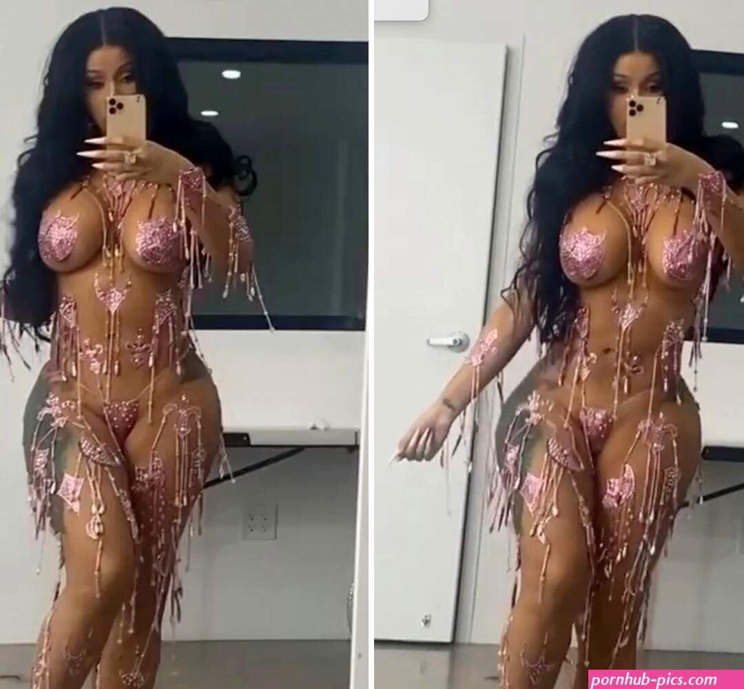 Cardi B goes nearly nude dances in JUST pink stickers beads as she promotes new single UP