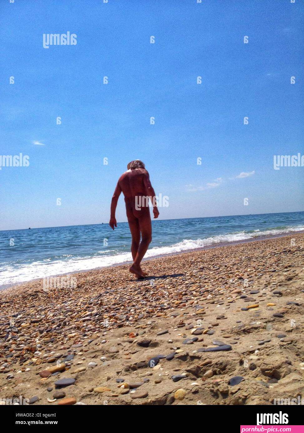 Nudism beach hi-res stock photography and images