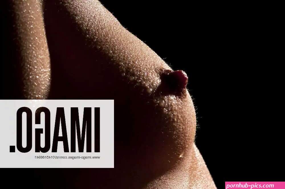 Naked breast with water drops model released Symbolfoto