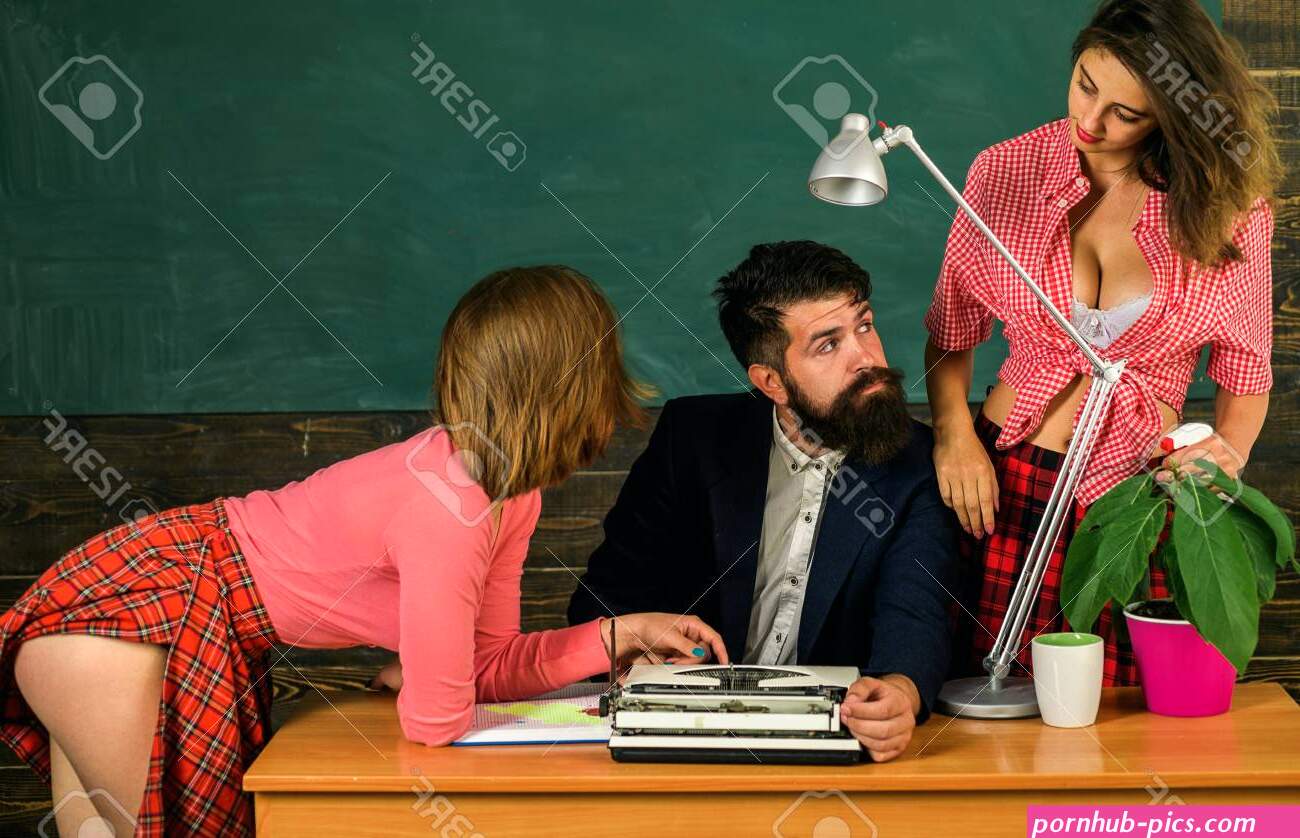 Bearded Sexology Teacher Looks At Two Sexy Female Students. Erotic Education And Sex Symbols On Chalkboard. Anatomy Lesson And Sex Education In High School. Lets Talk Sex. Sex Education. Stock Photo Picture