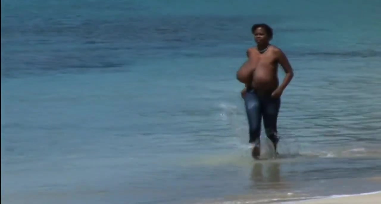 Topless model with HUGE boobs running on the beach at 2:28 in Dominican glamor model Feminist activist Mio.Supporting FreeTheNipple movement on a Caribbean beach