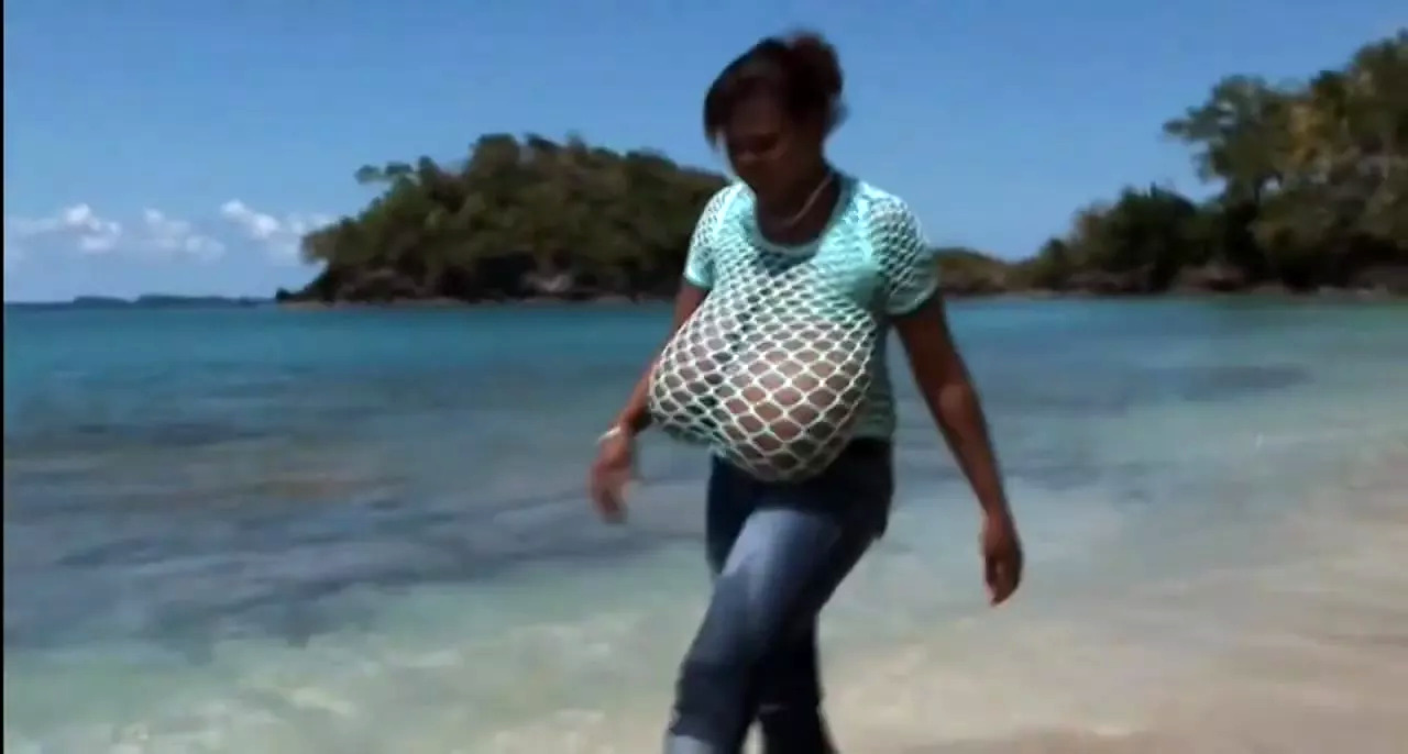 Topless model with HUGE boobs running on the beach at 2:28 in Dominican glamor model Feminist activist Mio.Supporting FreeTheNipple movement on a Caribbean beach