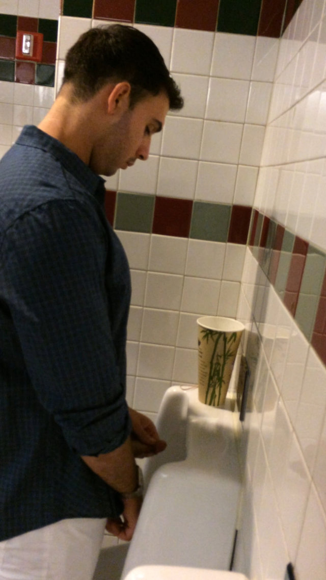 guy touching dick urinals