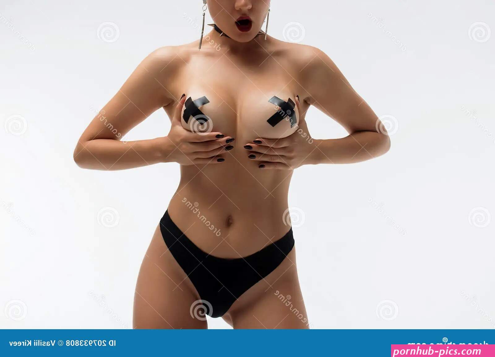 Young Woman with Black Tape on Breast Stock Photo