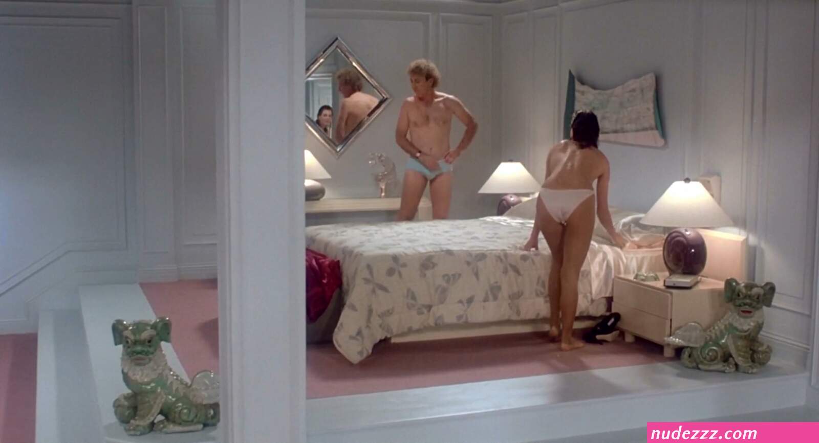 Kelly LeBrock braless in The Woman in Red
