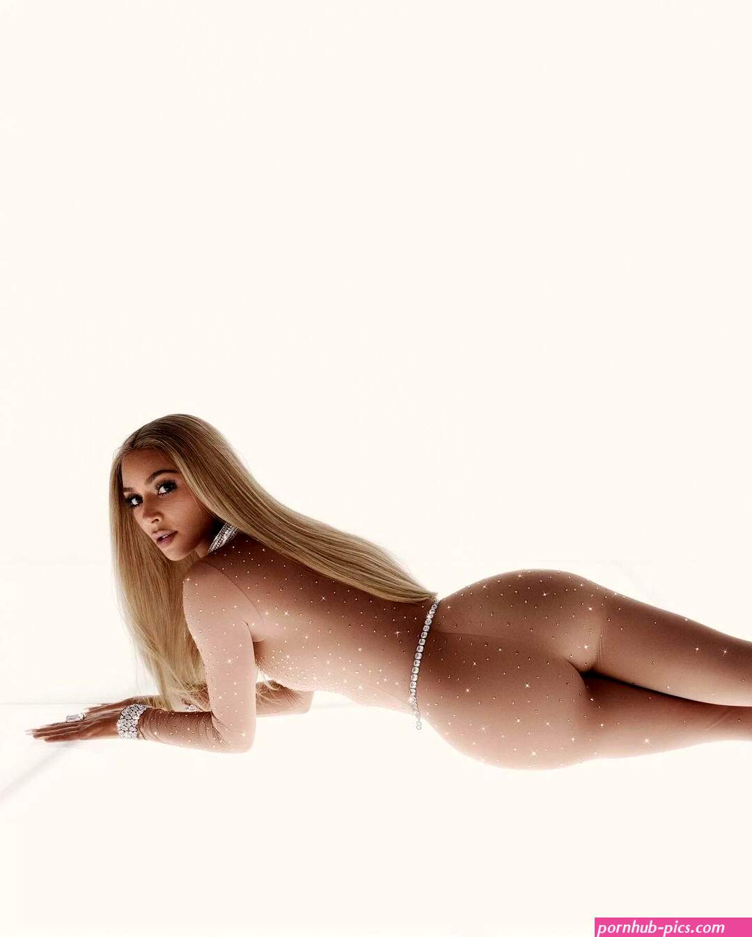 Kim Kardashian channels Britney Spears in sparkling nude bodysuit for Swarovski x Skims