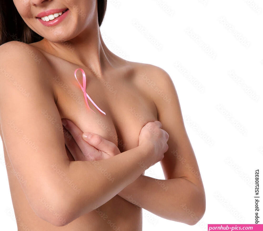Naked woman with silk ribbon on white background closeup. Breast cancer awareness concept Stock