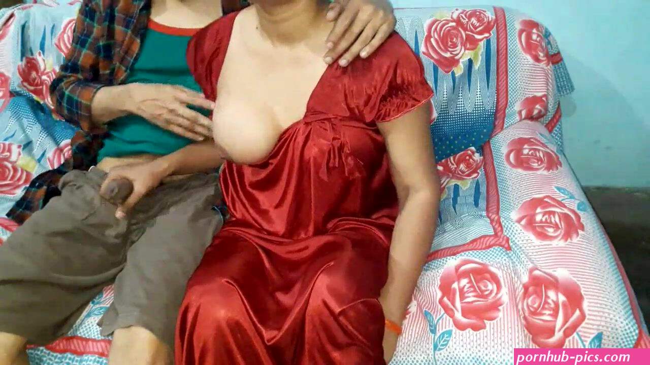 Desi man films Indian porn of unsuspecting Bhabhi in red nightgown
