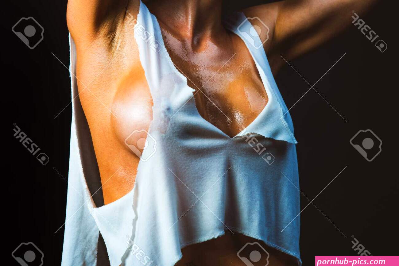 Close Up Photo Of Sexy Hot Womans Tit. Sensual Woman Demonstrating Beauty Of Her Sexy Young Body. No Plastic Surgery Concept. Sexy Woman Nipple Boob Covered Wet Top.