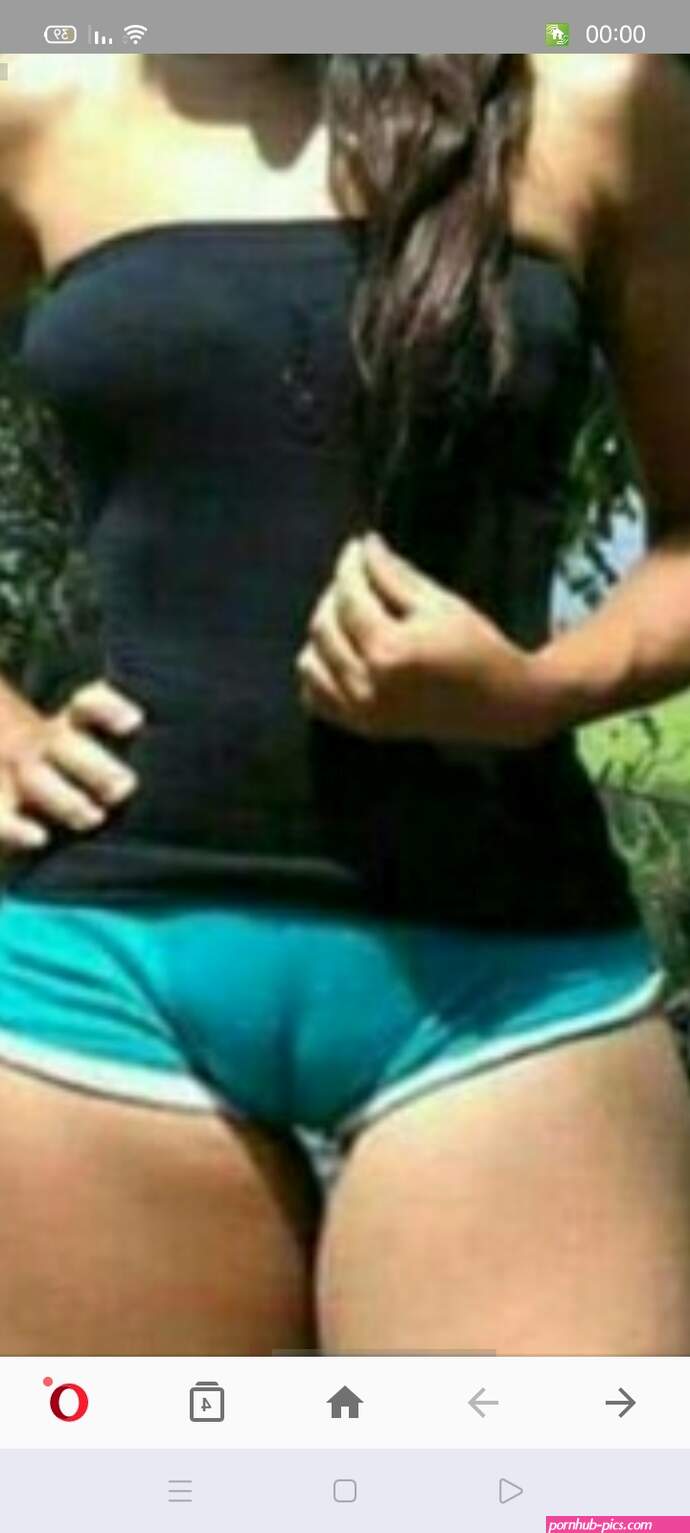 Why are some girls vaginas so big and fluffy? Is it because of the clothes they wear? Does the vagina of a woman wearing a pad look like this?
