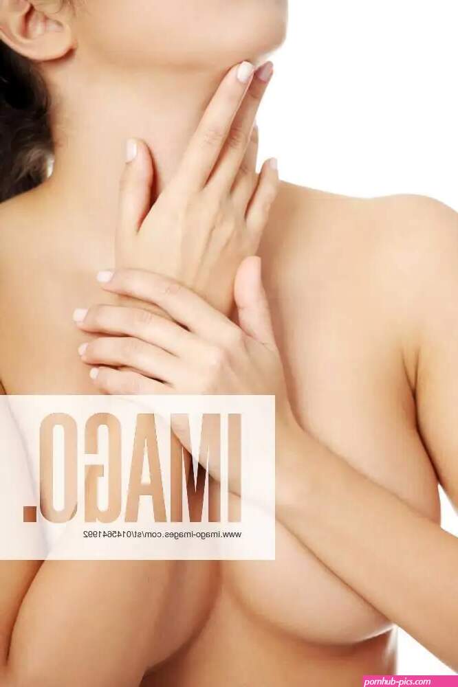Sexy beautiful naked woman covering her breasts. model released Symbolfoto