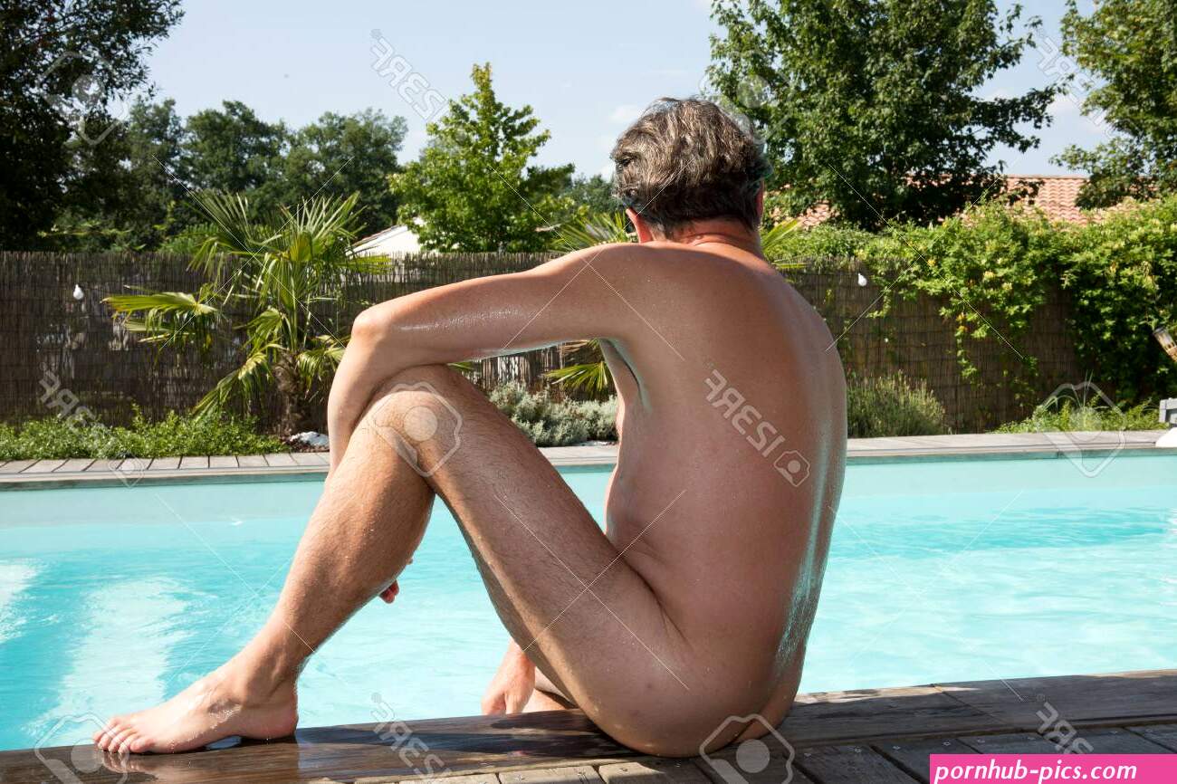 Attractive Nude Or Naked Man Resting On Edge Of Swimming Pool Stock Photo Picture and Royalty Free Image. Image 86956276.