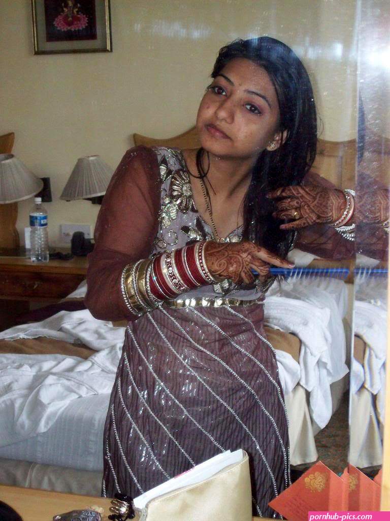 Indian girl models for nude nude shoot during her honeymoon