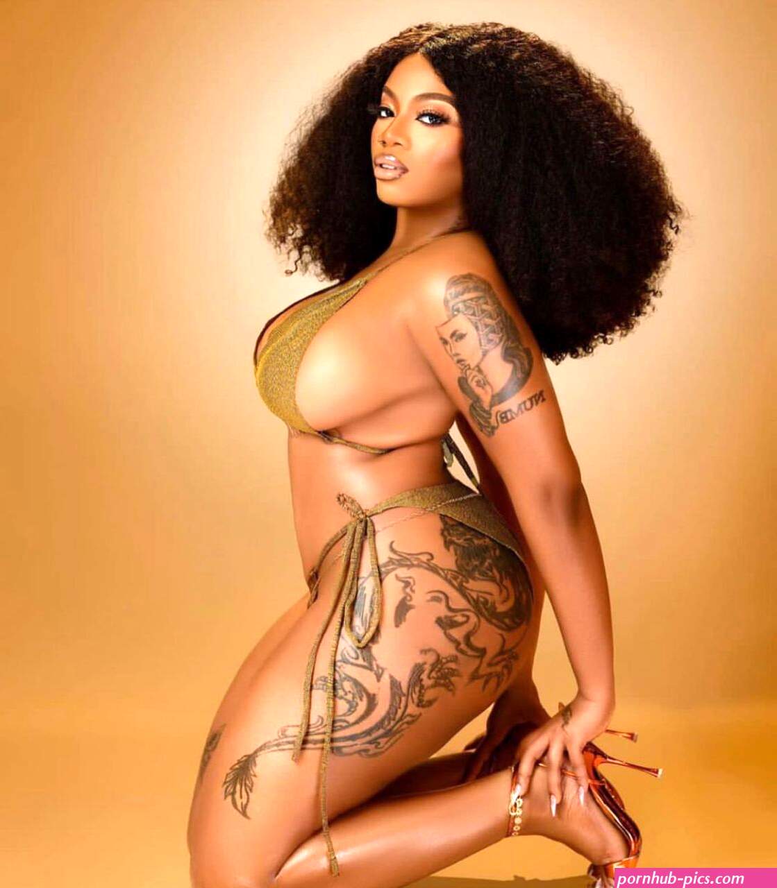 BBNaijas Angel flashes her boobs and butt in sexy bikini photo