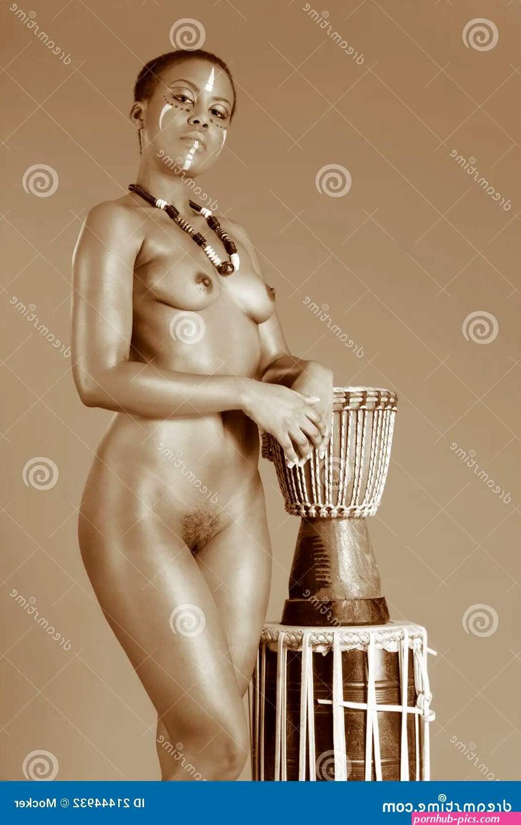 Indigenous Nude African American Woman with Drums Stock Photo