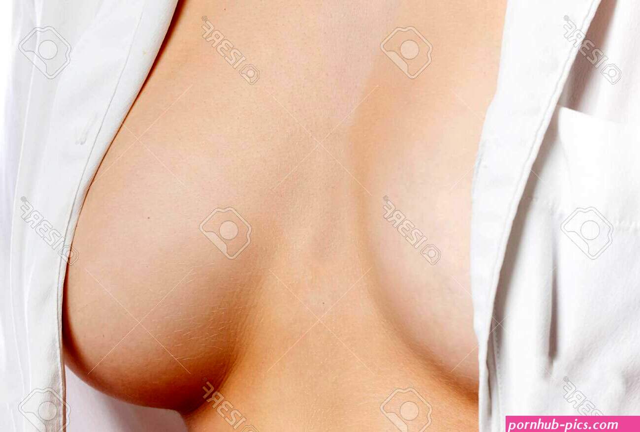 Beautiful Woman Breast. Perfect Breast Of Young Woman In White Shirt Close-up. -. Image 129137940
