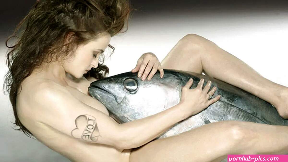 Helena Bonham Carter poses nude with a fish in strange photoshoot
