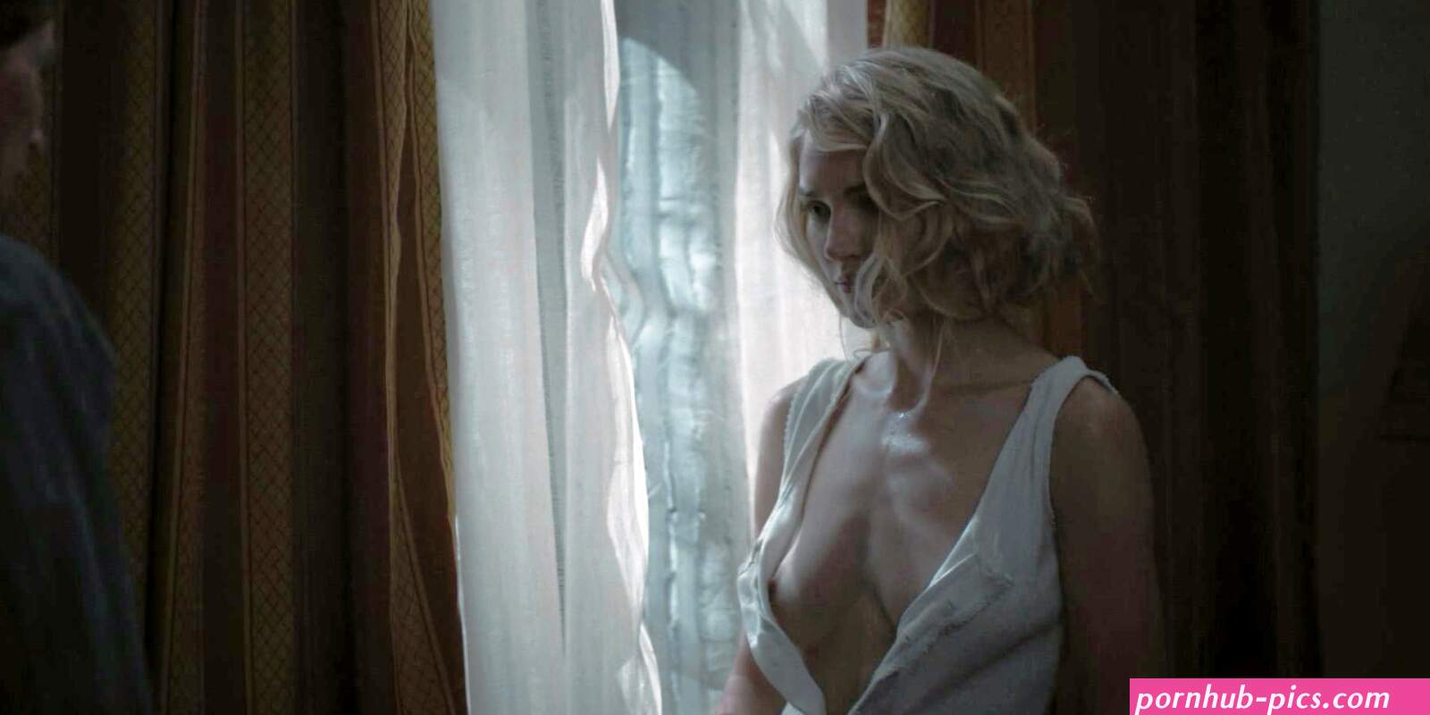 Modest nudity from Michelle Randolph in 1923 episode 3