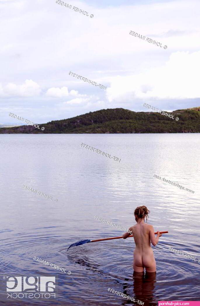 Young naked girl raking the bottom of a lake Sweden Stock Photo Picture And Royalty Free Image. Pic. NEF-JOHNER761319