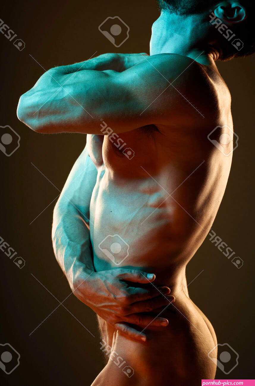 Muscle Strong And Body Of A Nude Man With Erotic Creativity Isolated On Black Background In Studio. Creative Flexing And Sexy Naked Model In Fluorescent Lighting For Sensuality On A Backdrop