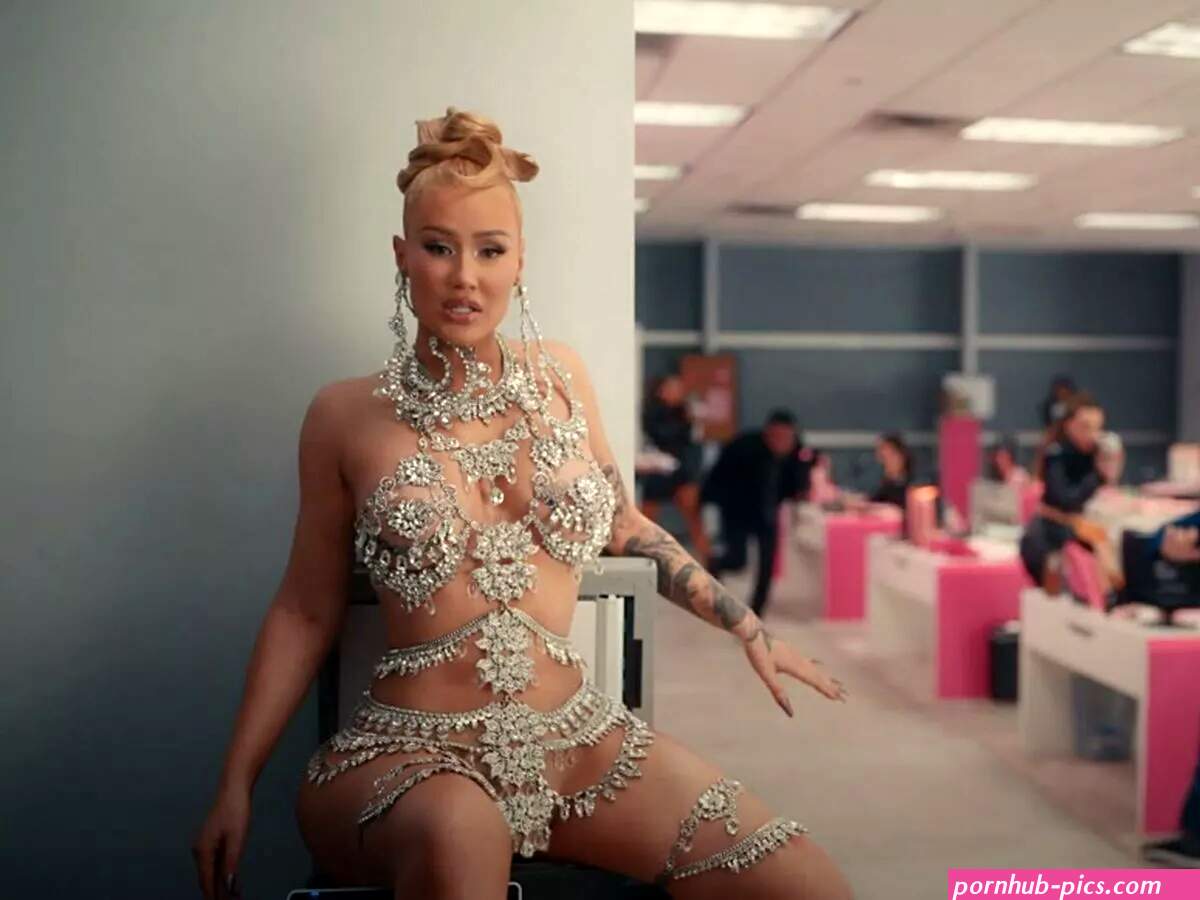 Iggy Azalea leaves little to the imagination as she wears nothing but diamonds in video
