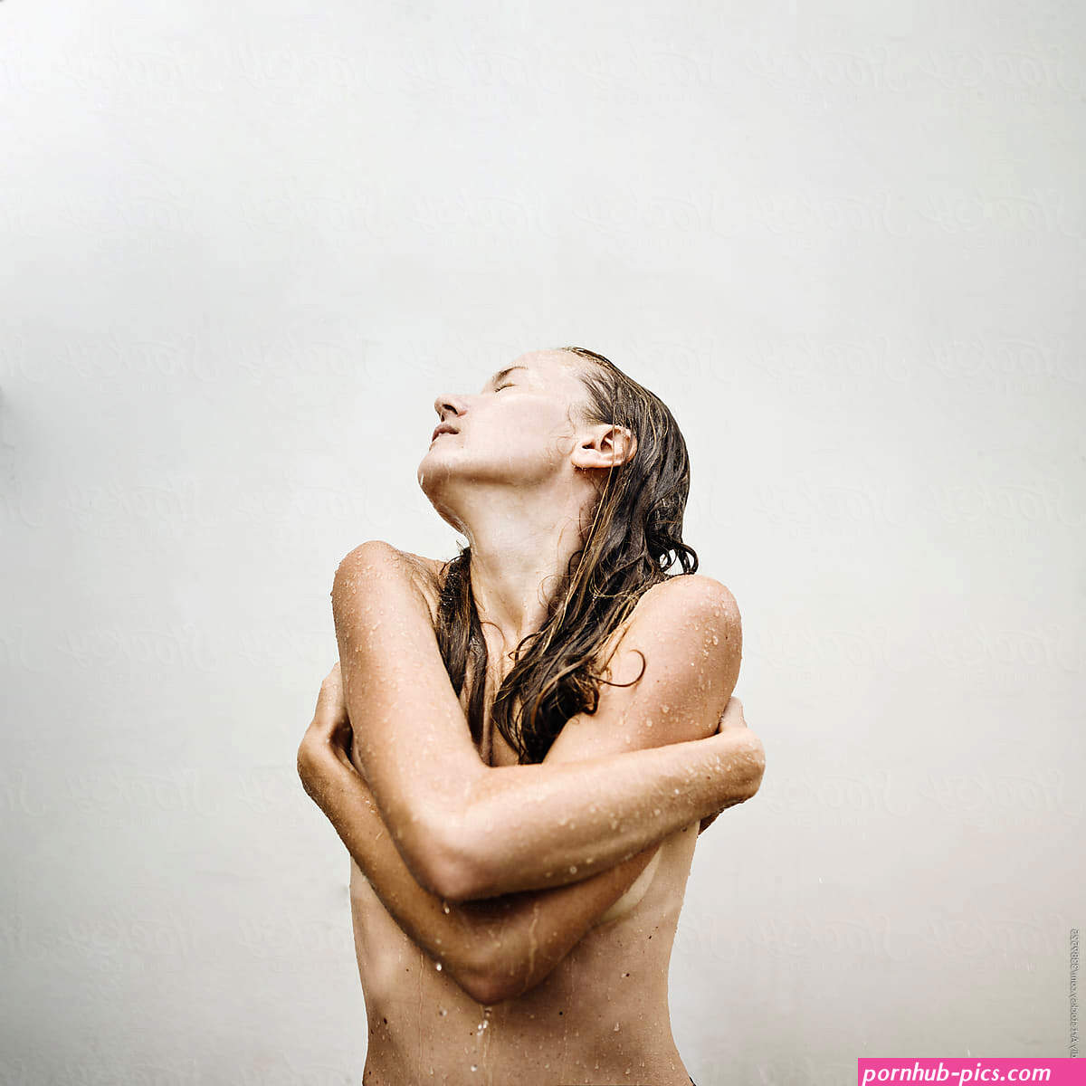 Young Naked Woman In The Rain by Stocksy Contributor Vradiy Art