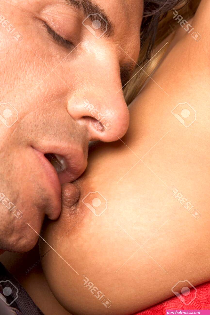 Sexuality Series. Sensual Couple Man Arousing His Lover Or Wife By Oral Stimulation Of Her Boobs nipple And Lips Are Out Of Focus! Stock Photo Picture and Royalty Free Image. Image 5645259.