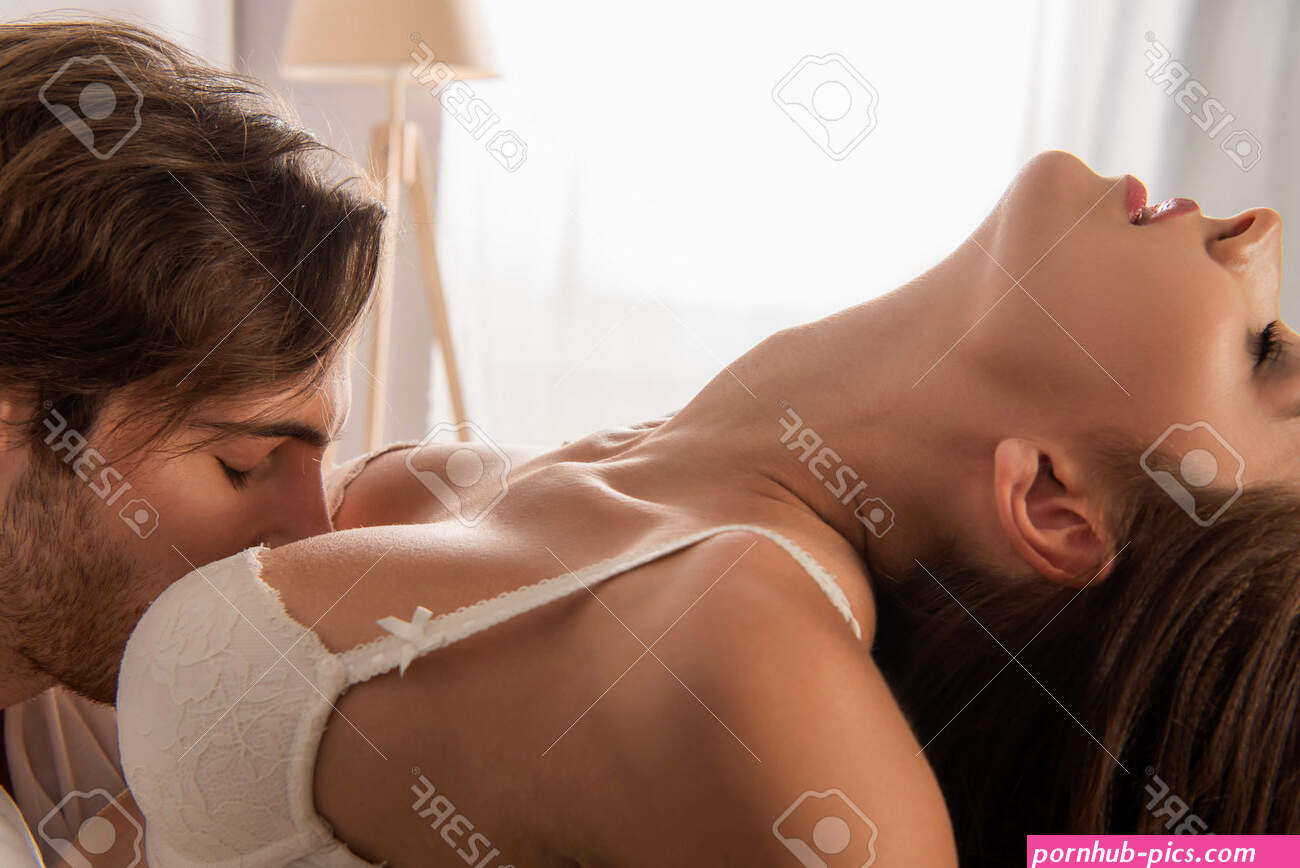 Side View Of Man With Closed Eyes Kissing Breast Of Woman With Sexy Body Stock Photo Picture and Royalty Free Image. Image 171257049.